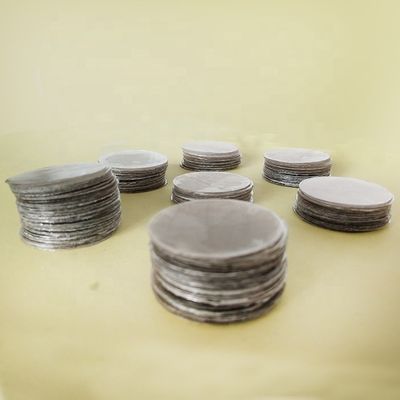 Température du four Contenu en CaO % 0,4-0,6 0,5 mm Rubis feuille de mica verte avec forme personnalisée