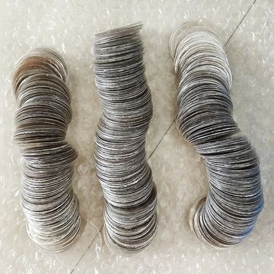 Température du four Contenu en CaO % 0,4-0,6 0,5 mm Rubis feuille de mica verte avec forme personnalisée