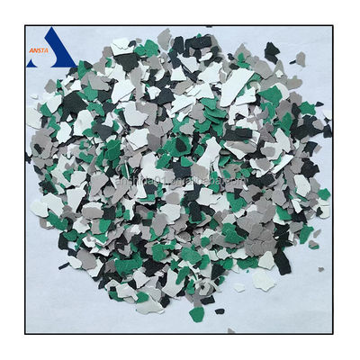 Méthode d'application des copeaux de roche composites par pulvérisation pour les revêtements de copeaux de flocons multicolores
